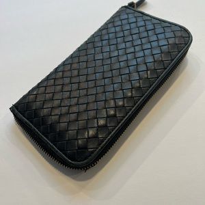 Bottega Veneta zip-around wallet.